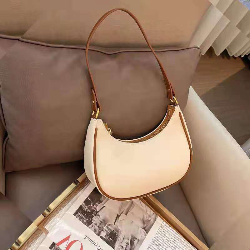 Women's armpit high-end and stylish single shoulder handbag, 2022 summer new item, contrasting color crescent small bag, women's bag