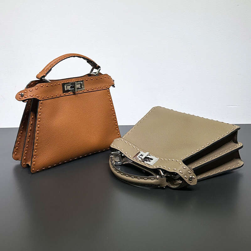 2023 New Peekaboo Fashion High End Knitted Kitten Bag, Shoulder Cross Carrying Organ Leather Bag For Women
