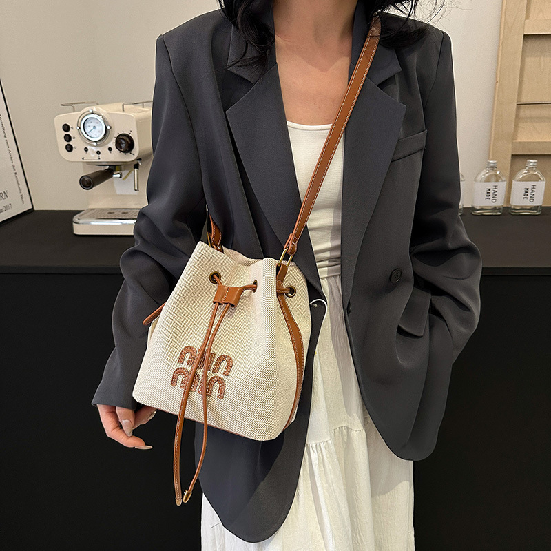 free shipping designer Shoulder Bags for woman Casual Fashion Tassel letter vintage Artwork composite bag