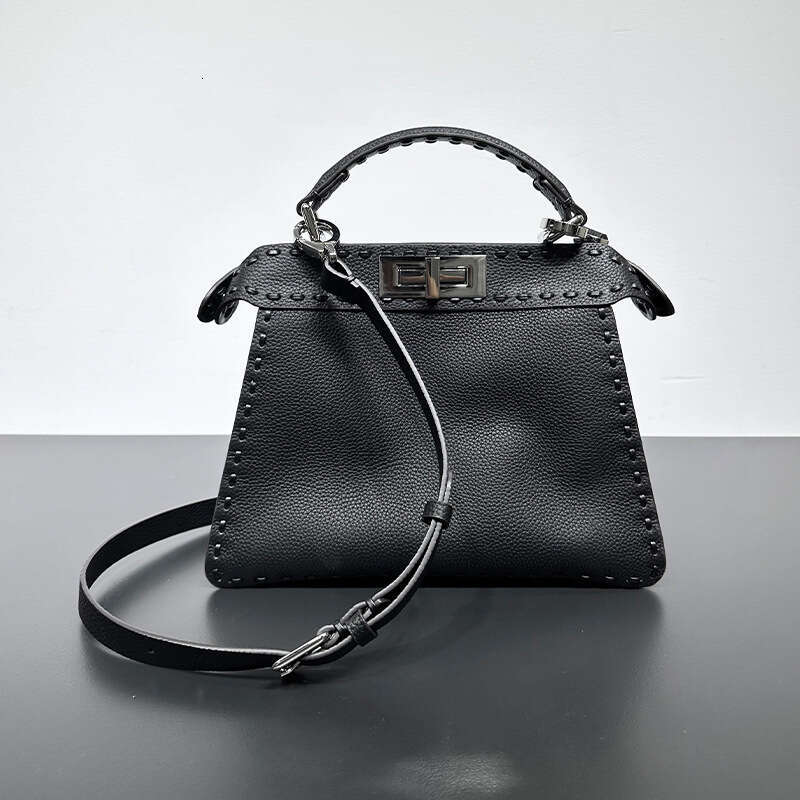 2023 New Peekaboo Fashion High End Knitted Kitten Bag, Shoulder Cross Carrying Organ Leather Bag For Women