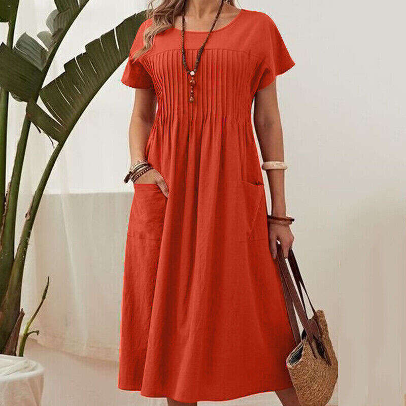 European and American women's long skirt solid color round neck pocket pleated short sleeved cotton en dress 2025 temperament versatile new trend