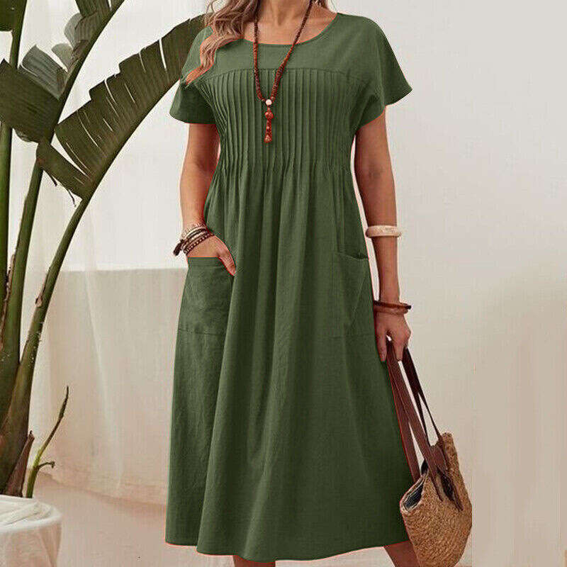 European and American women's long skirt solid color round neck pocket pleated short sleeved cotton en dress 2025 temperament versatile new trend