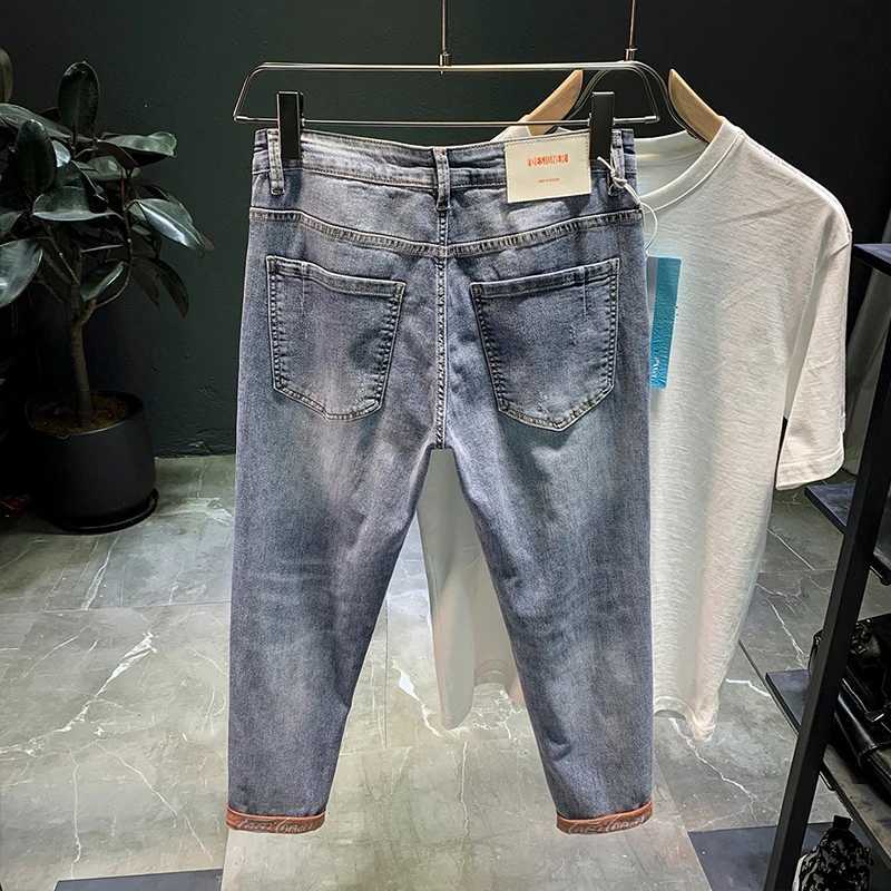2021 Mens Trendy Brand Loose Summer Thin Elastic Feet Pants Ripped Denim Jeans Mens Korean Harem Teenagers Cropped Pants X250812