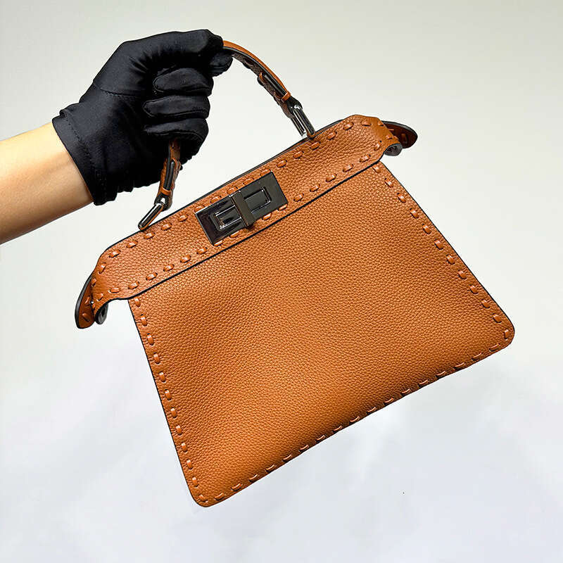 2023 New Peekaboo Fashion High End Knitted Kitten Bag, Shoulder Cross Carrying Organ Leather Bag For Women