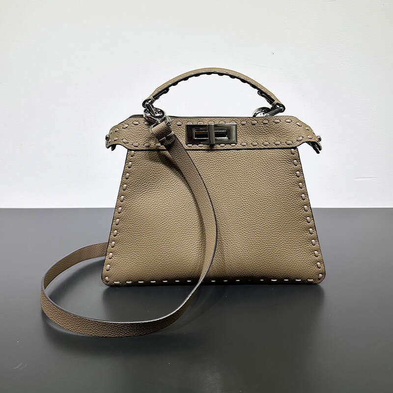 2023 New Peekaboo Fashion High End Knitted Kitten Bag, Shoulder Cross Carrying Organ Leather Bag For Women