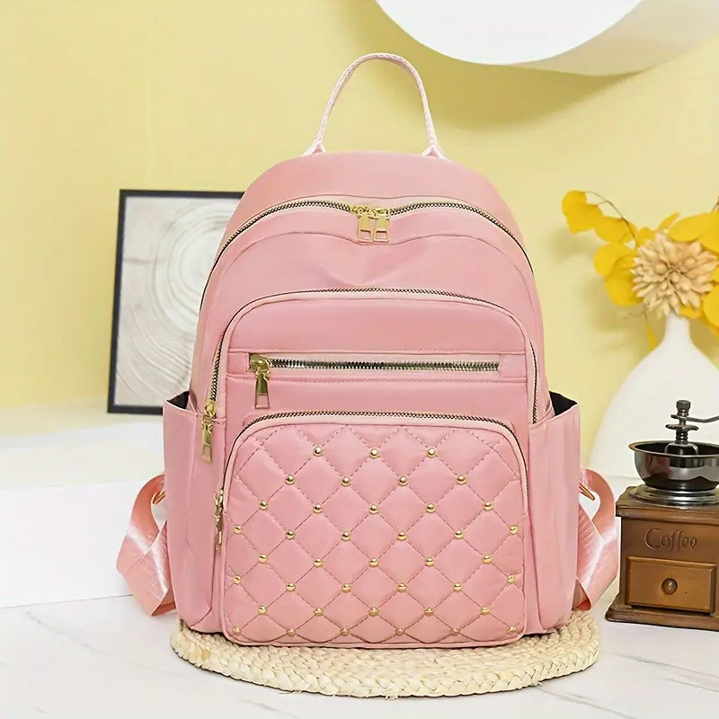 2025 Texture Rivet Backpack Large Capacity Simple Women s Diamond Grid Fashion Designer Summer Backpack New Outdoor Leisure Storage Bag Wallet Handbag