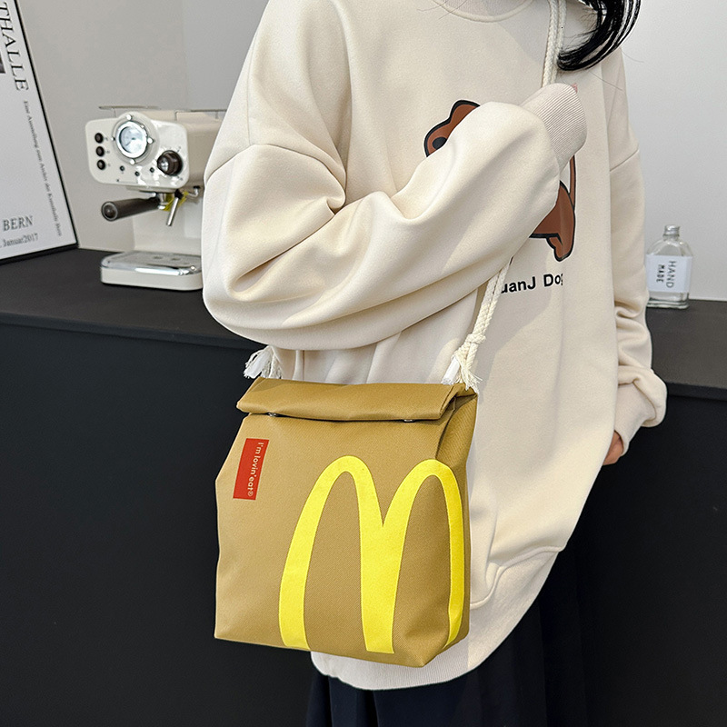Mcdonald s Backpack 2025 New Letter Printed Paper Backpack Fashion Designer Personalized Backpack Trend Outdoor Leisure Storage Bag