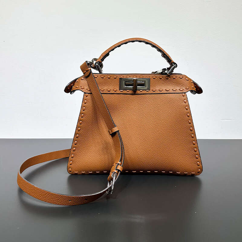 2023 New Peekaboo Fashion High End Knitted Kitten Bag, Shoulder Cross Carrying Organ Leather Bag For Women