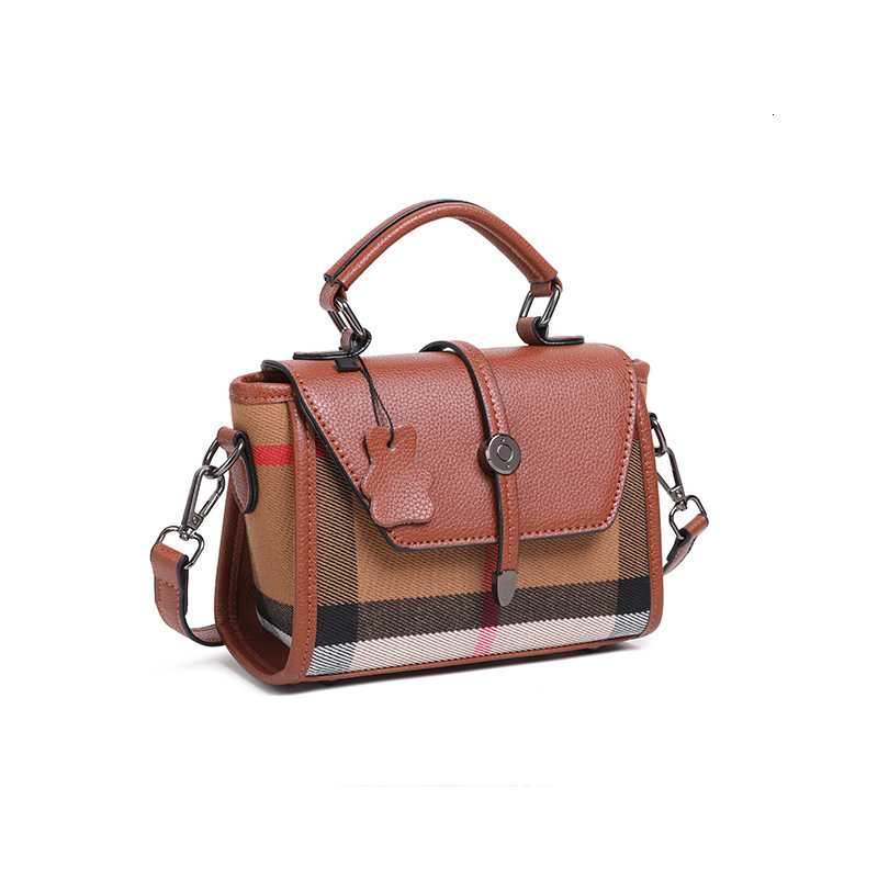 Designer's checkered contrasting color large capacity women's 2025 new shoulder commuting cross-border multifunctional handbag wing bag