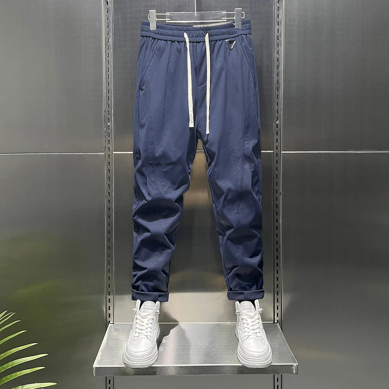 Summer tapered lightweight business casual pants suitable for men with elastic waist loose knit and fit 250313