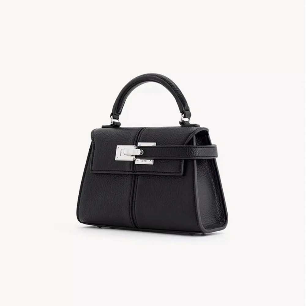 2025 NEW 2025 JW PEI Trapezoidal Leather Wens Bag Versatile hot Crossbody Fiable Niche Handbag Top-handle Handbags shoulder leather Y250313