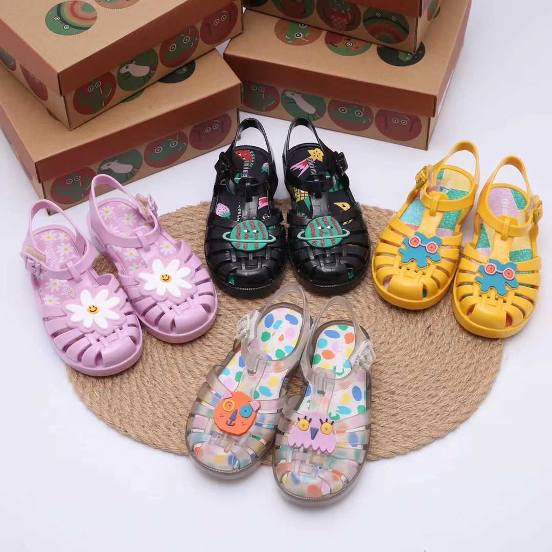 Sandals 2022 new Melissa flower planet boys and girls woven hollow sandals Baotou jelly fragrant shoesY250315F4SW