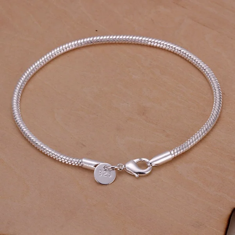 Charming 925 Sterling Silver Bangle Featuring Sleek Snake Motif Ideal Complement for Trendy Outfits