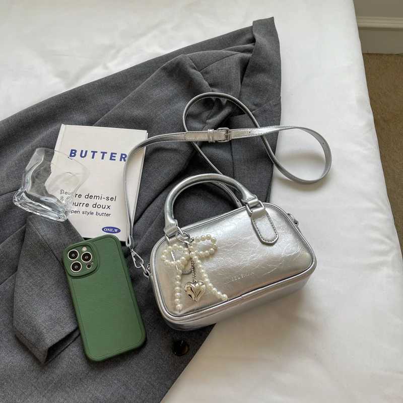 Solid color summer versatile 2024 new reliable design sense niche crossbody bag for wens handheld small square bag Y250321