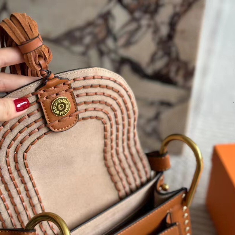2024 Autumn And Winter New Roy Suede Saddle Woven Tassel Rivet Horseshoe Buckle Women's Bag