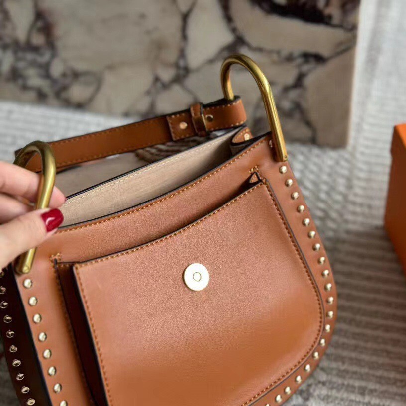 2024 Autumn And Winter New Roy Suede Saddle Woven Tassel Rivet Horseshoe Buckle Women's Bag
