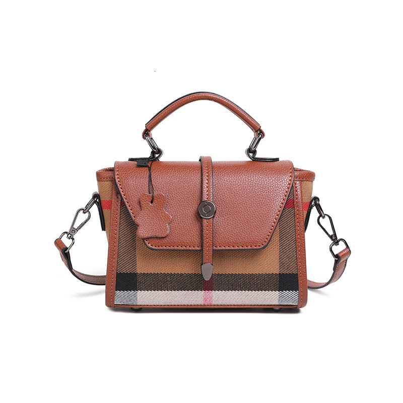 Designer's checkered contrasting color large capacity women's 2025 new shoulder commuting cross-border multifunctional handbag wing bag