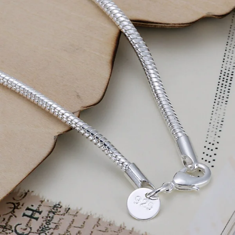 Charming 925 Sterling Silver Bangle Featuring Sleek Snake Motif Ideal Complement for Trendy Outfits