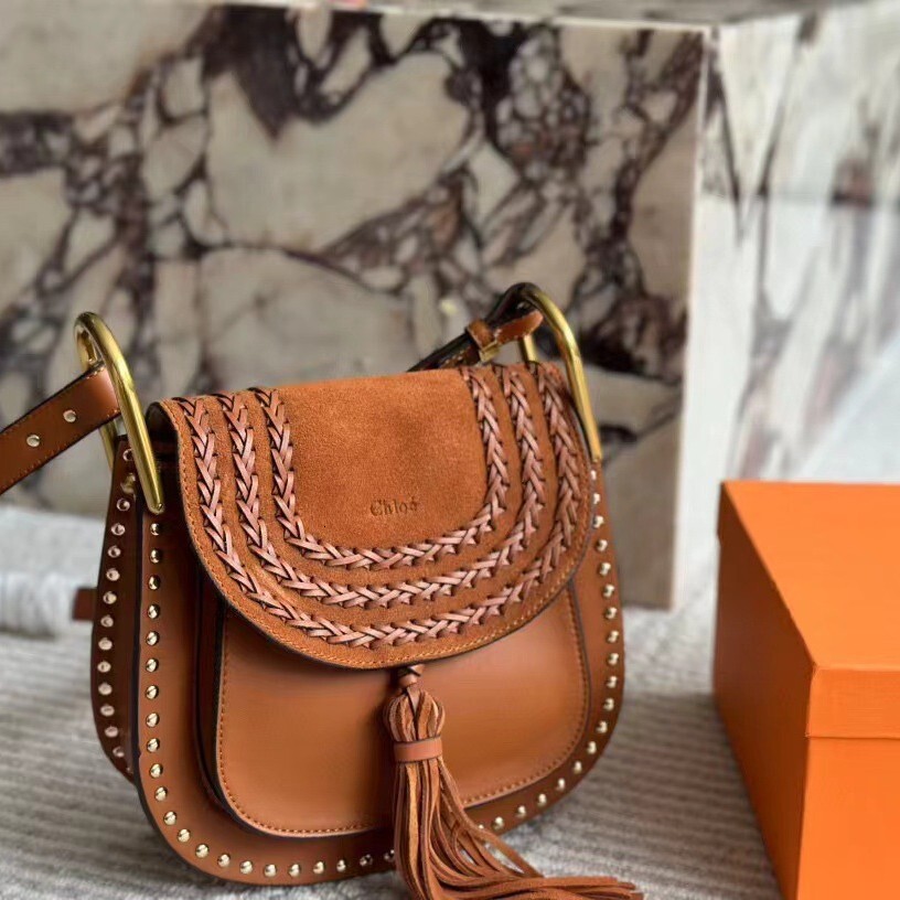 2024 Autumn And Winter New Roy Suede Saddle Woven Tassel Rivet Horseshoe Buckle Women's Bag