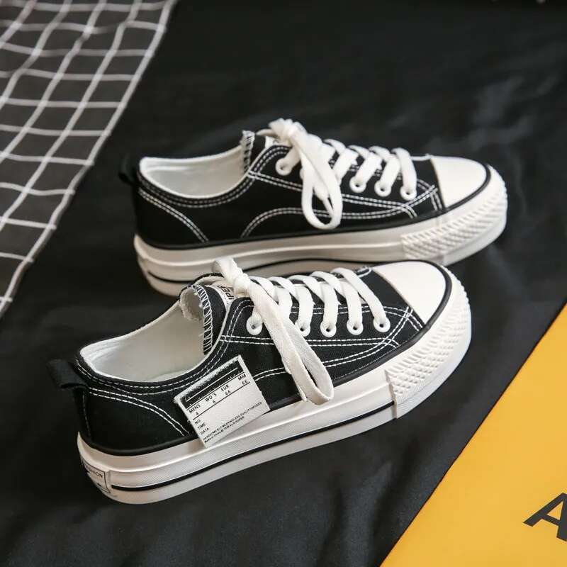 2025 new solid color low top Korean style casual canvas designer trendy and fashionable women's multifunctional thick soled shoes enhance figure1
