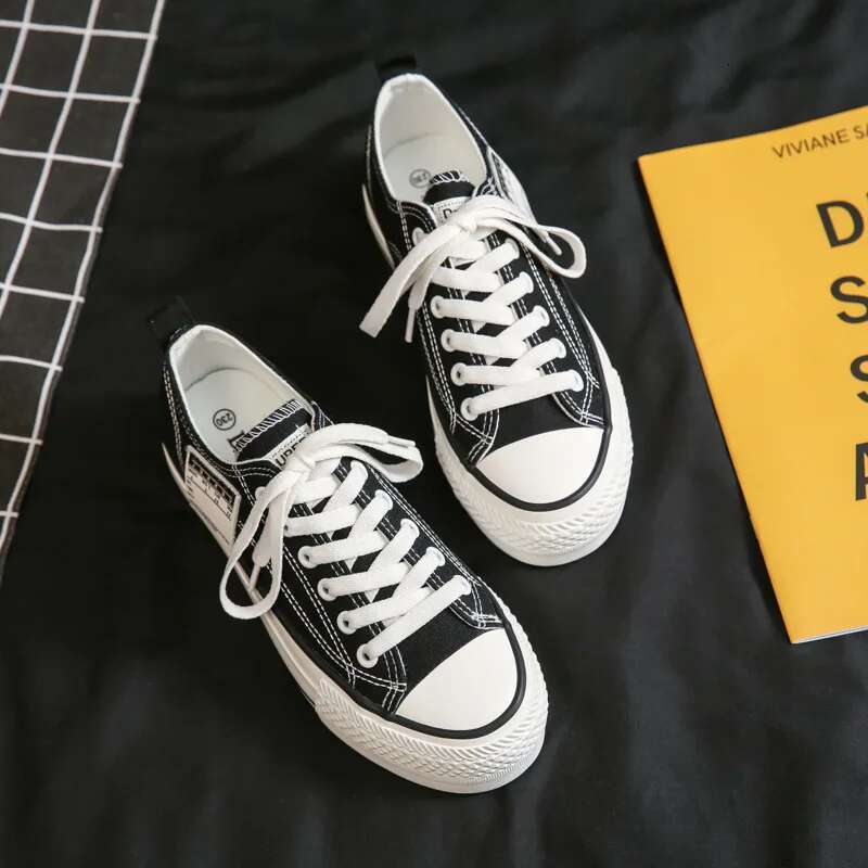 2025 new solid color low top Korean style casual canvas designer trendy and fashionable women's multifunctional thick soled shoes enhance figure1