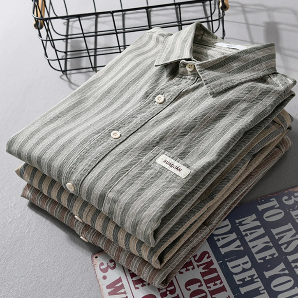 Mens long sleeved shirt Spring and Autumn mens clothing fashion striped mens cotton shirt loose mens top 250314