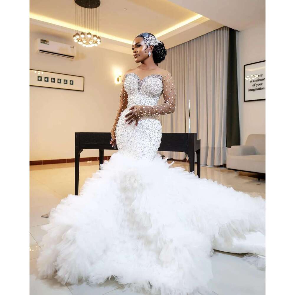 2025 Customized African heavy bright crystals full beads mermaid long sleeves layers tulle wedding dress for brides