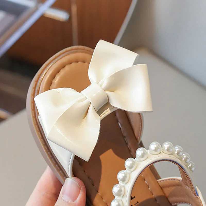 Girl sandals cute bow pearl baby shoes soft flat shoes princess shoes fashionable childrens beach sandals beige yellow black H02254T250315