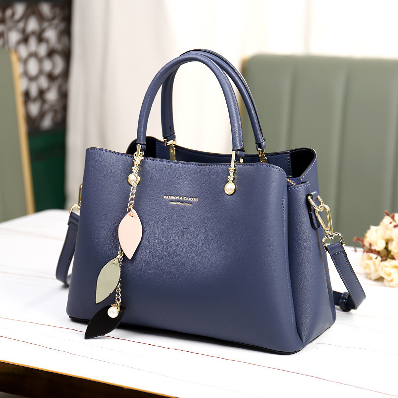 Women's 2025 New Light Luxury Single Cross Shoulder Handheld Commuter High End Genuine Leather Mom Bag