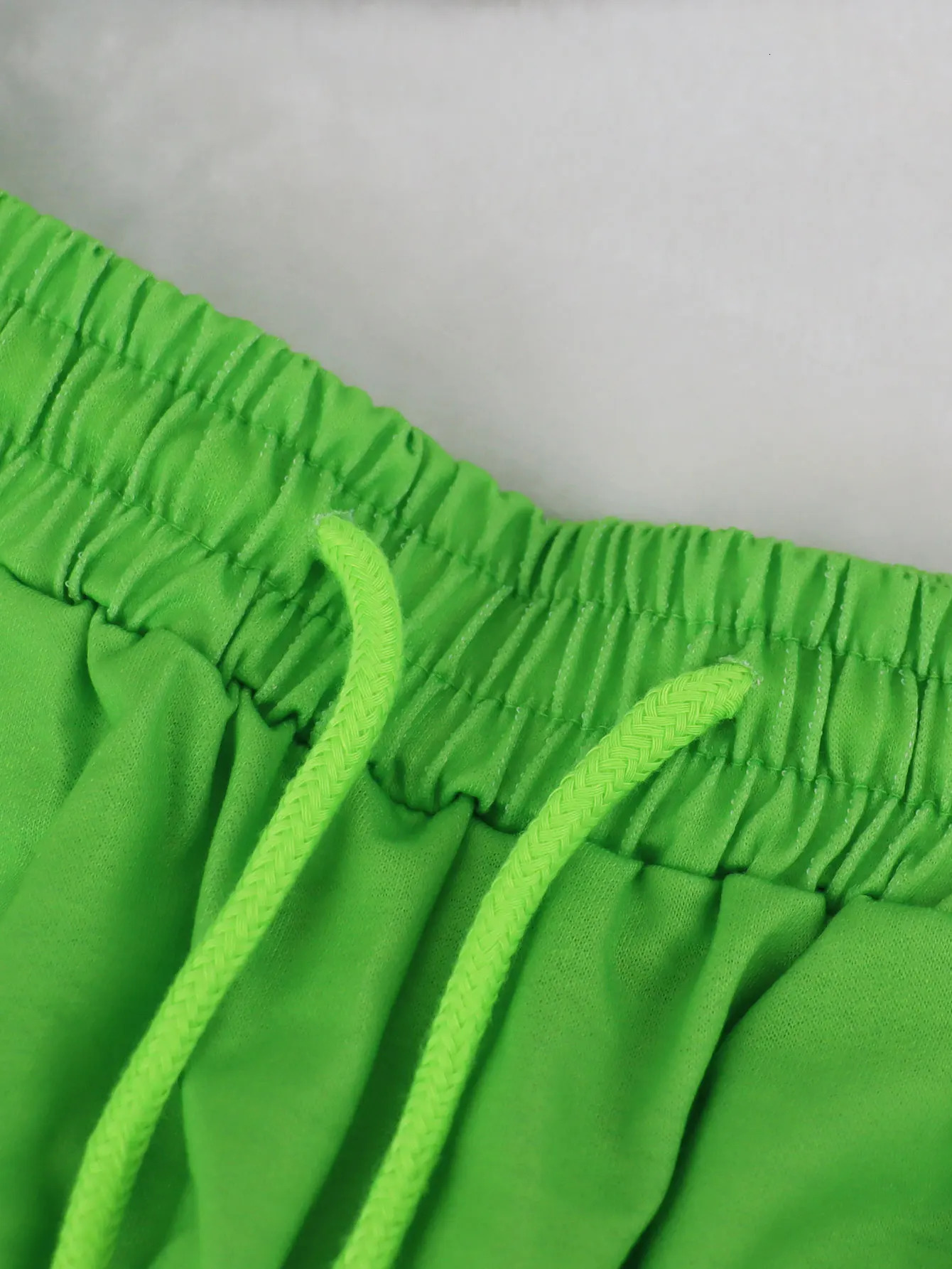 Trendy Neon Green Sweatpants with Cartoon Prints | Comfortable Stylish Joggers for Casual Wear Elastic Waist Soft Fabric 250313