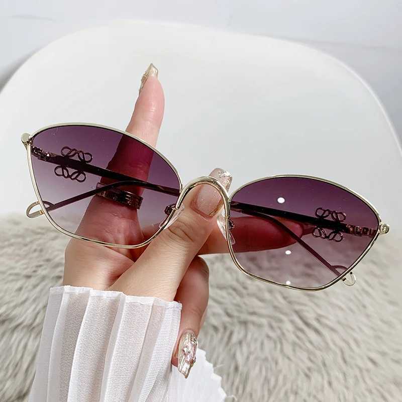 2024 Fashion metal sunglasses Trent womens cats eyes outdoor street photography glasses Internet celebrity sunglasses W250315