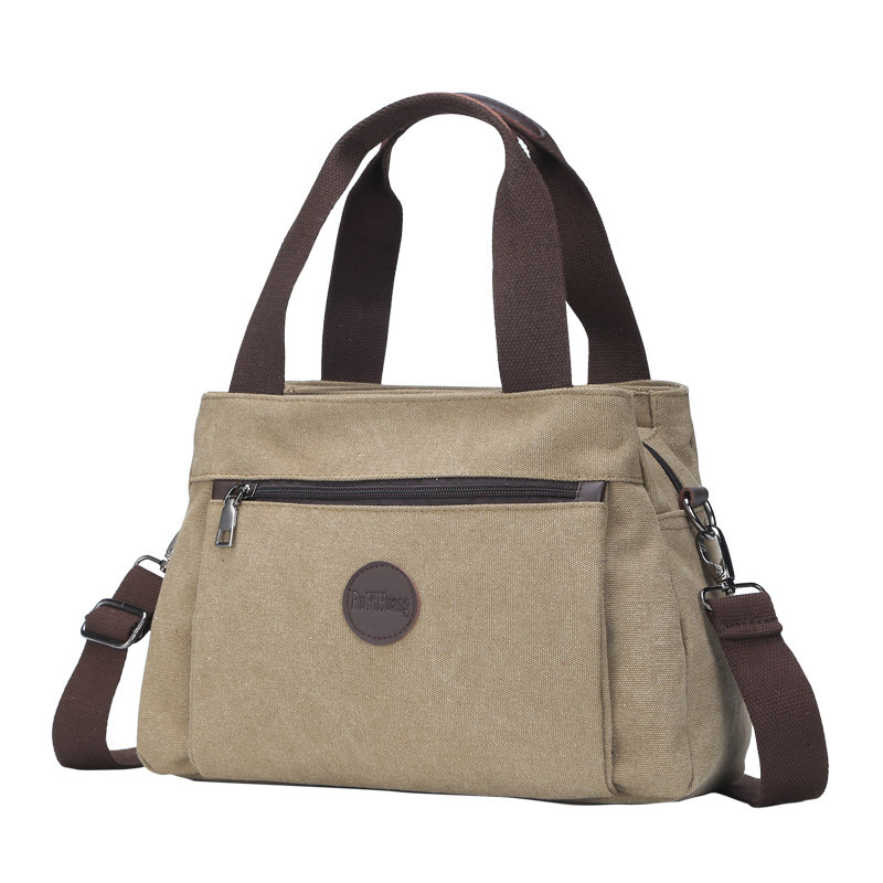 Leisure backpack Handheld One Shoulder Crossbody Women's Large Capacity Multi compartment Canvas designer bag