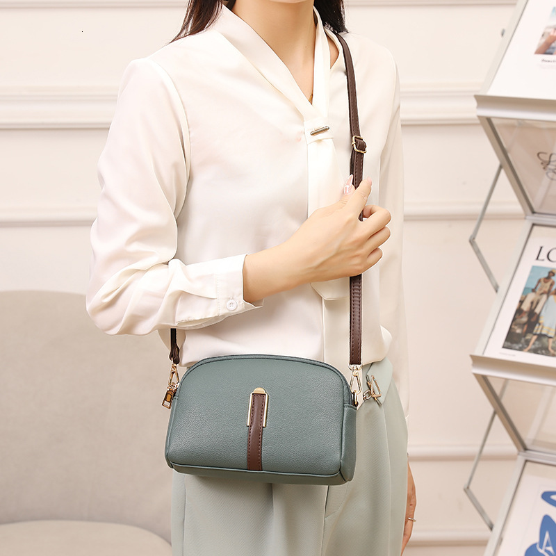 Women's 2024 New Spring/Summer Shell Korean Edition Simple Shoulder Zero Wallet Texture Western Style Crossbody Small Bag