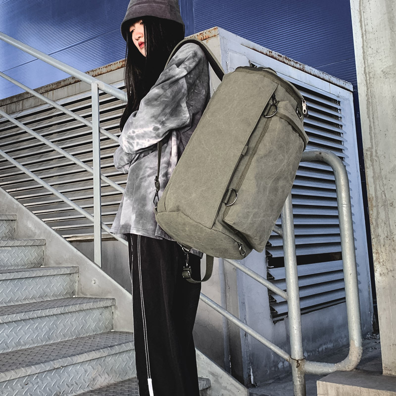 Fashionable bag, large capacity men's outdoor travel sports cylindrical backpack, trendy canvas backpack
