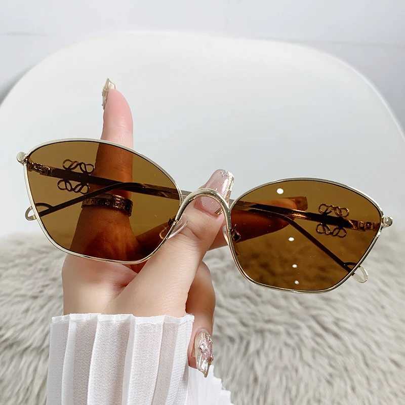 2024 Fashion metal sunglasses Trent womens cats eyes outdoor street photography glasses Internet celebrity sunglasses W250315
