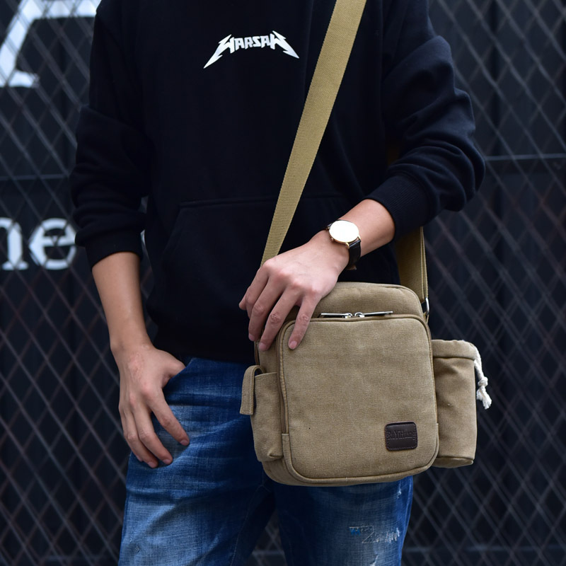 Trendy backpack workwear canvas with multiple compartments, leisure, fashionable men's one shoulder crossbody designer