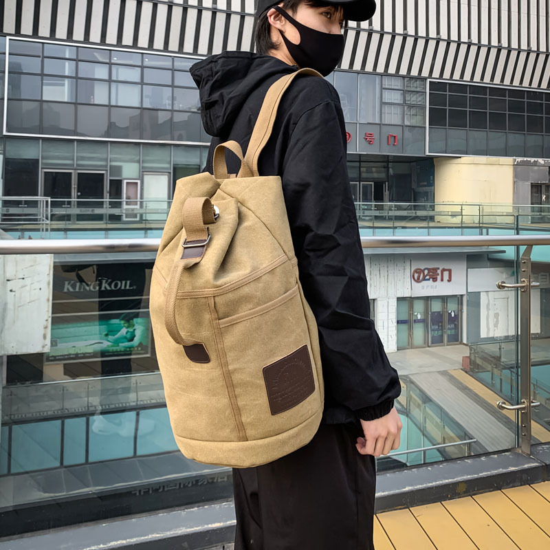 Fashionable designer bag, large capacity men's and women's outdoor travel sports water tank backpack, trendy canvas backpack