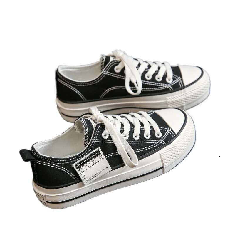 2025 new solid color low top Korean style casual canvas designer trendy and fashionable women's multifunctional thick soled shoes enhance figure1