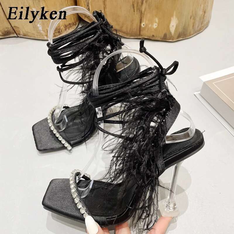 Eilyken New Design Womens Sandals Fashion Fuzzy Feather Summer Transparent High Heels Sexy Nightclub Stripper Shoes Purple Green