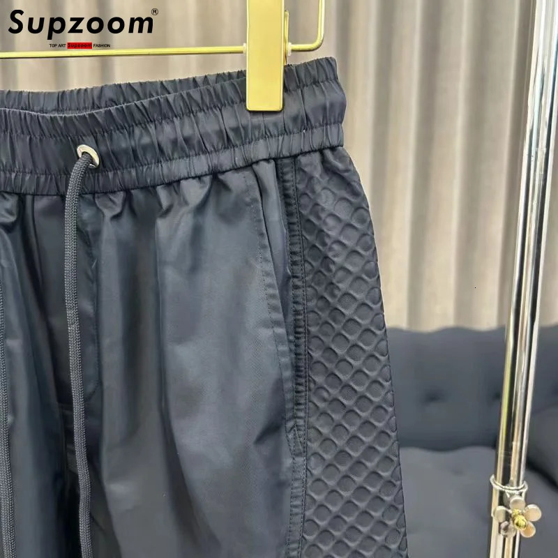 Supzoom has arrived at the top of fashion with a loose casual waistband for summer featuring street fashion mesh splicing pockets and personalized men