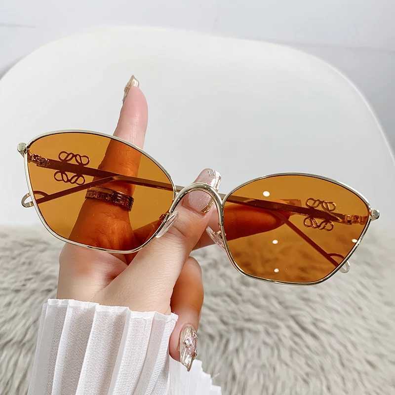 2024 Fashion metal sunglasses Trent womens cats eyes outdoor street photography glasses Internet celebrity sunglasses W250315