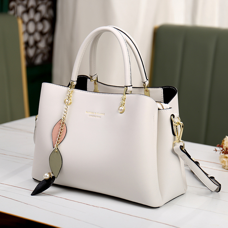 Women's 2025 New Light Luxury Single Cross Shoulder Handheld Commuter High End Genuine Leather Mom Bag