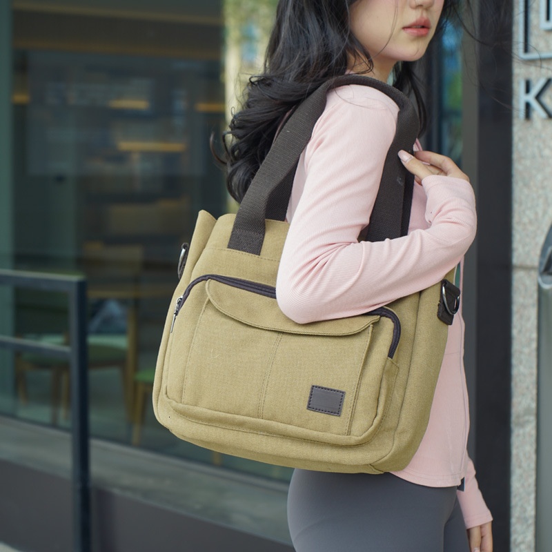 Fashionable backpack and casual canvas women's portable one shoulder crossbody, commuting large capacity multi compartment bag designer bag