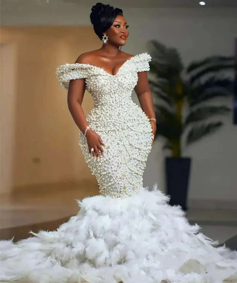 2025 Customized bright heavy handwork pearls trumpet dresses for bride off shoulder wedding dress of the with layers tulle