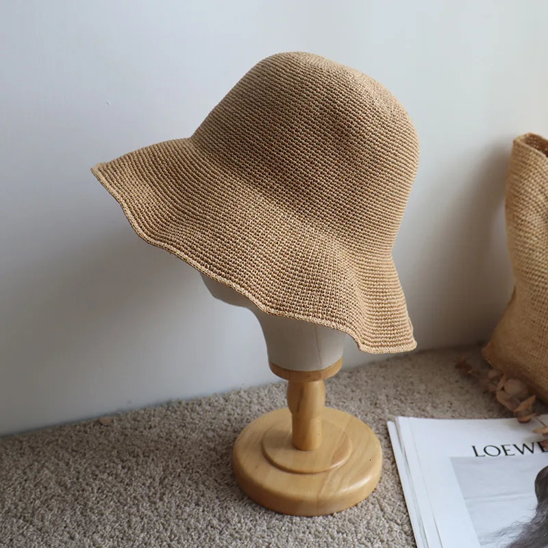 Foldable hand crocheted paper straw bucket hat suitable for womens summer sunshine breathable straw bucket hat 250314