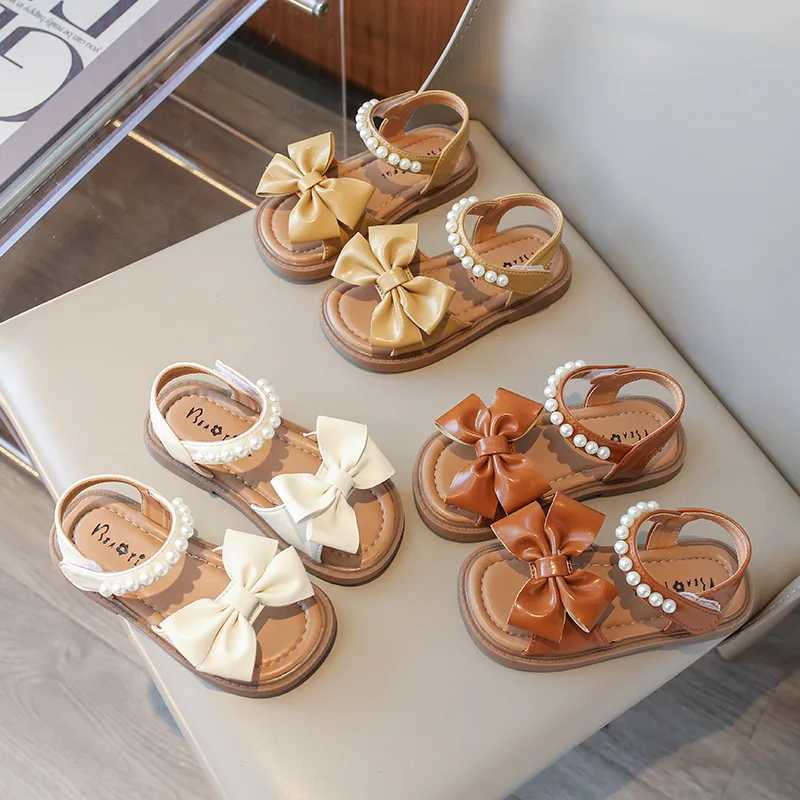 Girl sandals cute bow pearl baby shoes soft flat shoes princess shoes fashionable childrens beach sandals beige yellow black H02254T250315