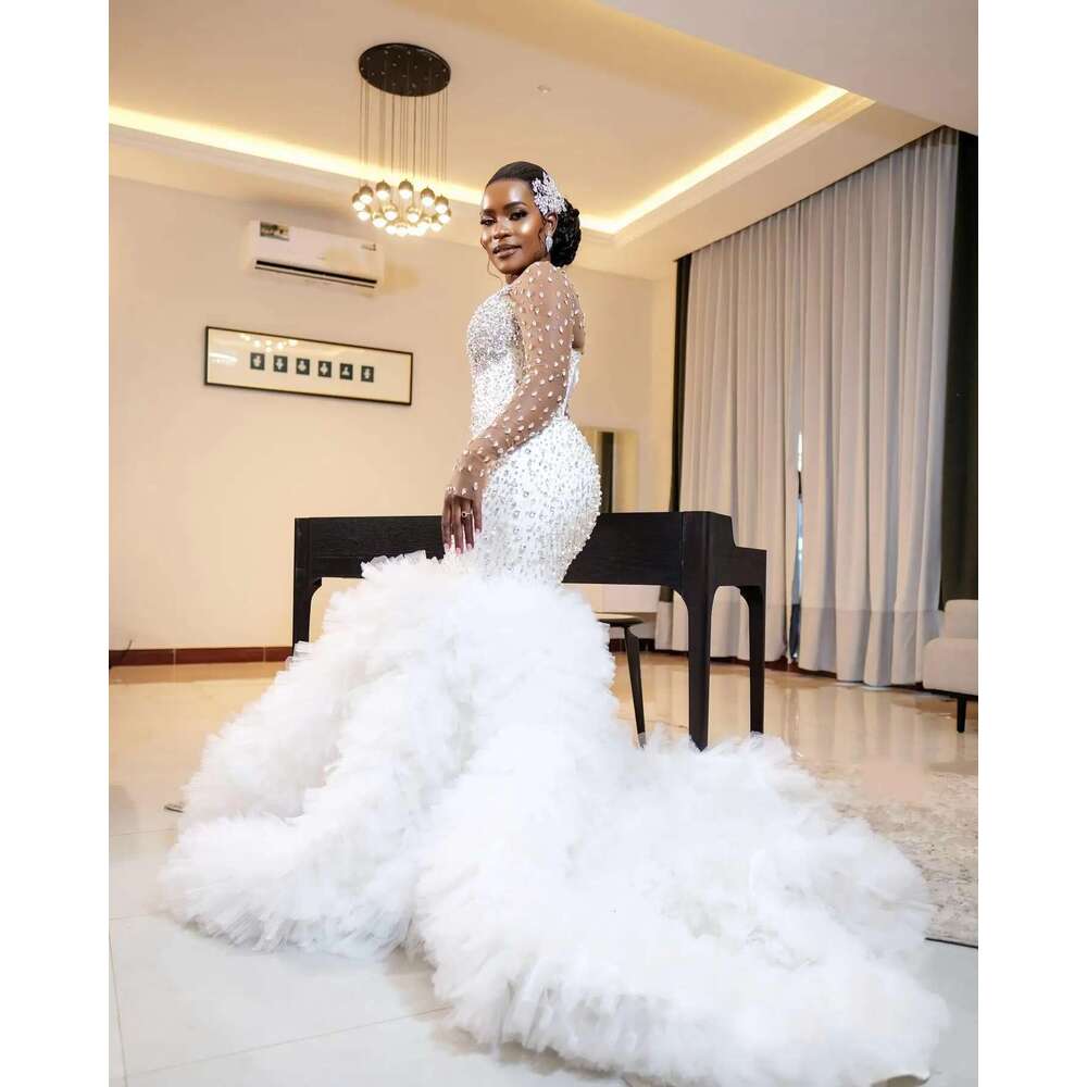 2025 Customized African heavy bright crystals full beads mermaid long sleeves layers tulle wedding dress for brides