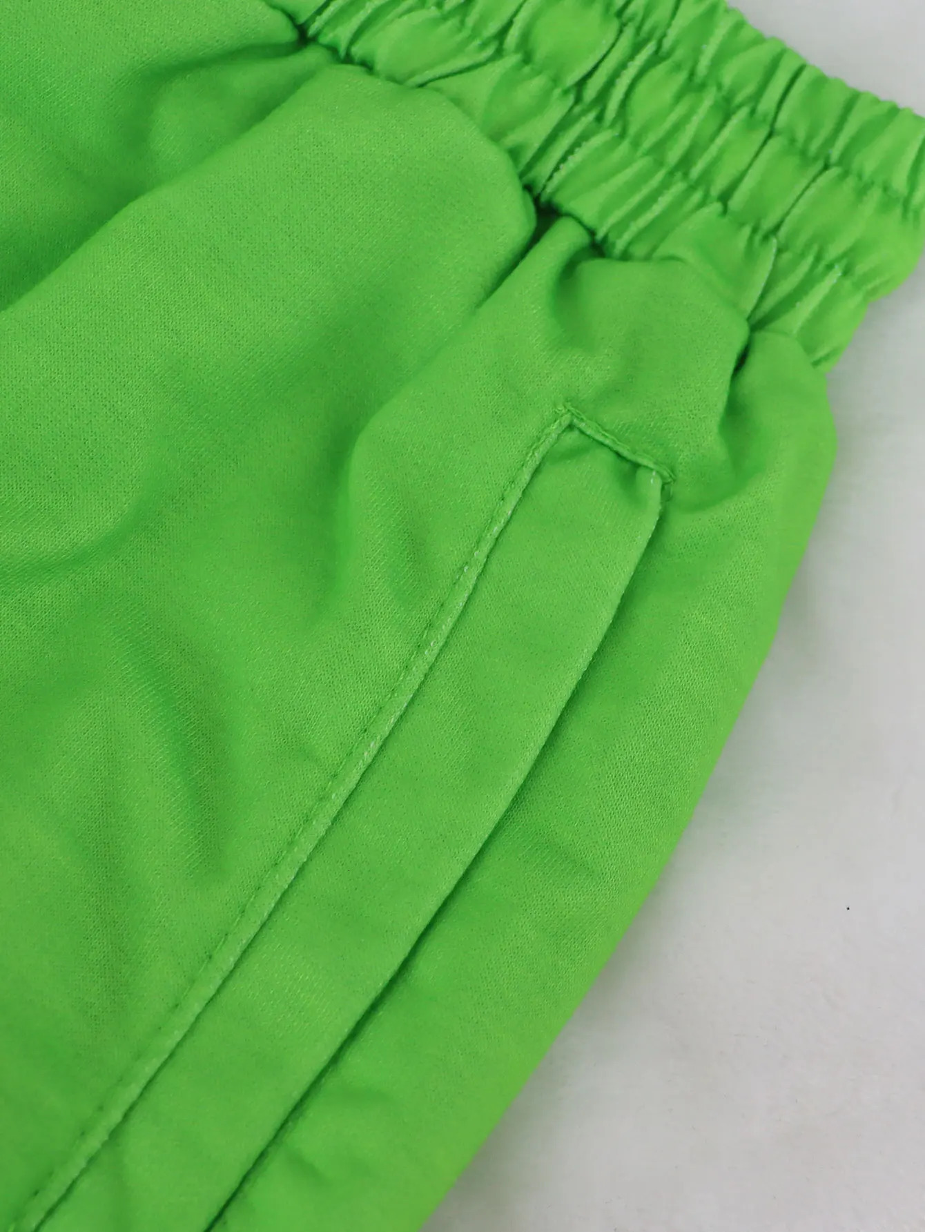 Trendy Neon Green Sweatpants with Cartoon Prints | Comfortable Stylish Joggers for Casual Wear Elastic Waist Soft Fabric 250313