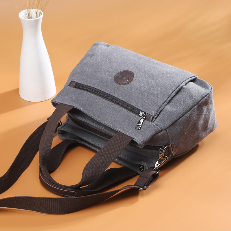 Leisure backpack Handheld One Shoulder Crossbody Women's Large Capacity Multi compartment Canvas designer bag