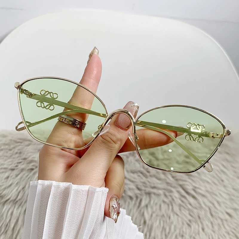 2024 Fashion metal sunglasses Trent womens cats eyes outdoor street photography glasses Internet celebrity sunglasses W250315